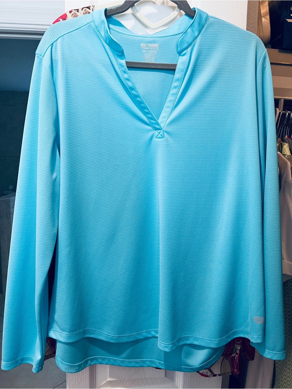 Reel Legends Women’s Long-Sleeve V-Neck Top in Aqua Blue